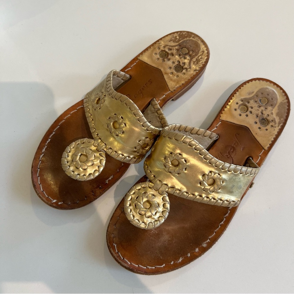 Very worn gold Jack Rogers size 6 (have shrunk a bit due to water exposure)